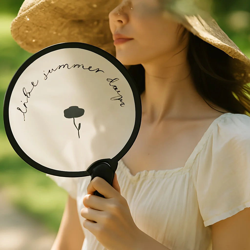 Portable handheld folding fan with storage bag, compact and portable, suitable for outdoor activities in summer